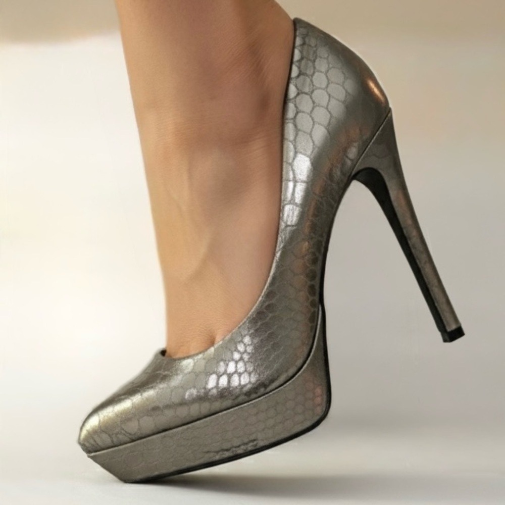 BCBGeneration Silver Pumps